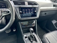 * R-Line exterior design with black styling elements, Black window surrounds, and Black exterior mir... (image 7)