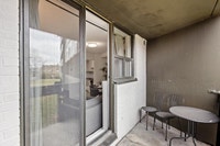 Fully renovated spacious suite features kitchen with modern features and finishes including laminate... (image 1)
