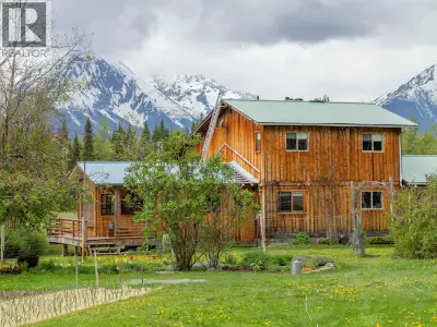 PRIVACY at it's BEST! Take in the beautiful setting of this custom home on 94 acres. Located in sunn...