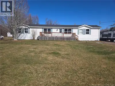Mini Home on Owned Land with Large Garage/Workshop Just Outside the City Welcome to this 3-bedroom,...