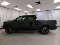 Remarkably capable, our 2022 RAM 1500 Rebel Crew Cab 4X4 is a terrific trail truck with a rugged Dia... (image 4)