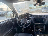 This Volkswagen Tiguan delivers a Intercooled Turbo Regular Unleaded I-4 2.0 L/121 engine powering t... (image 8)