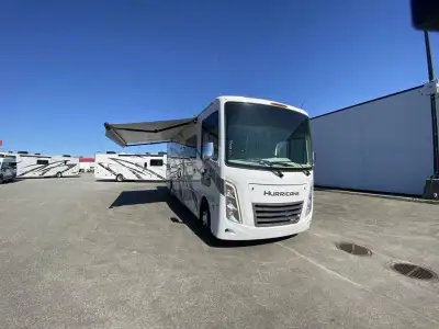 Thor Motor Coach Hurricane Class A gas motorhome 31C highlights: 68in.in. Sofa Bed Broom Closet King...