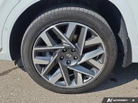 Wrapped in a stunning Quartz White, this 2022 Hyundai Santa Fe Ultimate Calligraphy offers a journey... (image 8)