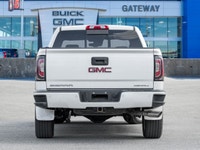 Turn heads and experience refined luxury with the 2018 GMC Sierra 1500 Denali, blending bold design,... (image 6)