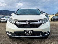 Experience an exceptional driving journey in the 2017 Honda CR-V Touring, featuring an immaculate wh... (image 2)