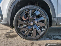 The 2024 Volkswagen Taos Highline, finished in a pristine white, comes equipped with an all-wheel-dr... (image 6)