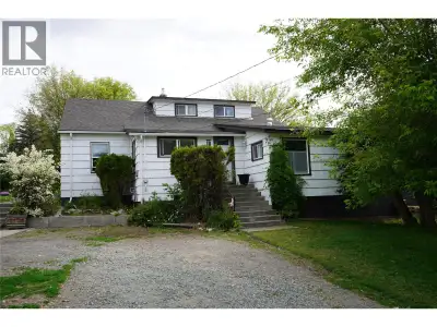 Estate style family home found in this 4 bedroom, 2 bath character home with detached shop in a cent...