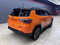 For a quick response please text 403-820-9940. AMVIC licensed business The 2026 Jeep Compass Trailha... (image 4)