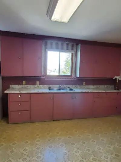 Nestled in the pine trees Welcome home to this inviting main-floor, two-bedroom, one-bath apartment...