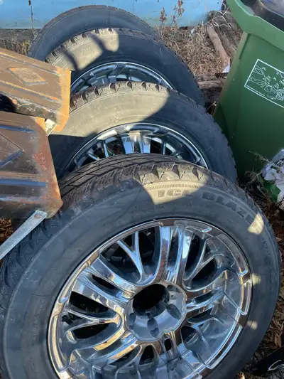 Good tread and chrome rims 20” GMC /Chev Price for all !!! these rims were approximately $200 each n...