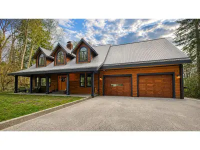 1 acre where refined luxury meets warm, cabin-inspired design. This exceptional 5-bdrm, 3-bth home o...