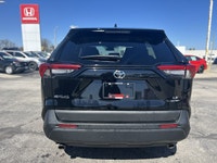 Ready for adventure and the everyday commute, this 2024 Toyota RAV4 LE, presented in striking Midnig... (image 5)