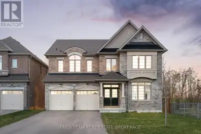 Top 5 Reasons You Will Love This Home: 1) Expansive five bedroom home in Alcona, ideally situated ne...