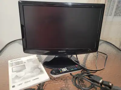 TV  Sharp 19 pouces avec télécommande 20$. Support mural 10$, View more