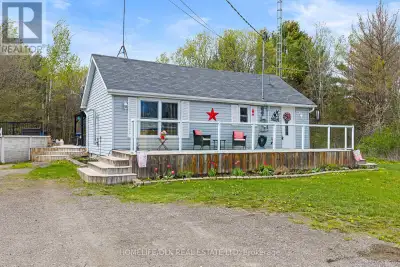 Escape to the peace and privacy of country living with this charming 3 bedroom, 1 bath bungalow situ...