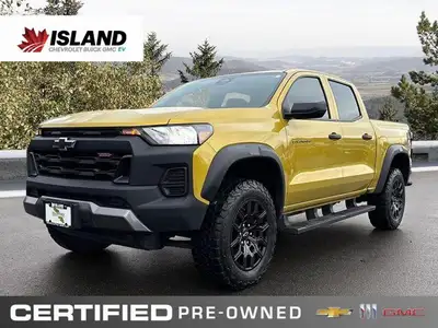 Unleash robust capability with this 2023 Chevrolet Colorado 4WD Trail Boss, presented in striking Ni...