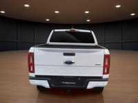 Experience the power of a 2019 Ford Ranger XLT in a crisp white finish, equipped with a robust 4x4 d... (image 6)