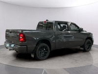 Meet the 2026 Ram 1500 Sport, a robust 4x4 Crew Cab finished in a refined gray exterior. This truck... (image 4)