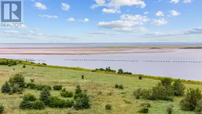 Breathtaking building lot just east of Malpeque Harbour, overlooking iconic Island sand-dunes, the h...