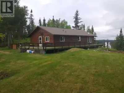 One-of-a-kind waterfront property, end of the road wilderness paradise with all the amenities of hom...
