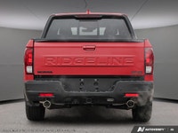 Introducing the 2026 Honda Ridgeline TrailSport AWD, a striking new truck that's unmissable in its b... (image 4)