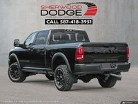 This Ram 2500 has a powerful Regular Unleaded V-8 6.4 L/392 engine powering this Automatic transmiss... (image 3)