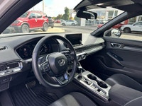 Experience the sleek lines and exhilarating performance of this 2025 Honda Civic Hatchback Hybrid Sp... (image 8)