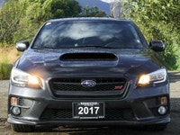 Feel the thrill of the road with the 2017 Subaru WRX STI Sport, finished in a striking shade of gray... (image 5)