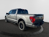 Check out this vehicle's pictures, features, options and specs, and let us know if you have any ques... (image 2)