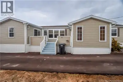 Welcome to 250 Nepisiguit Drive in Domaine du Ruisseau. This upgraded 4-bedroom, 1-bath mini home, o...