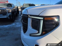 Experience the power and versatility of the 2026 GMC Sierra 1500 Elevation, a new white Crew Cab Sho... (image 8)