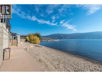 LAKE & MOUNTAIN VIEWS! TURN-KEY WATERFRONT LIVING! Welcome to unit 105-13011 Lakeshore Drive in Summ...