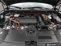 Experience the pinnacle of luxury and performance with the 2026 Honda CR-V Hybrid Touring AWD in stu... (image 5)
