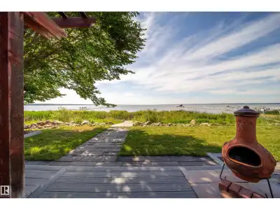 Lakefront Bungalow Retreat at Pigeon Lake!Enjoy year-round serenity in this beautifully upgraded lak...