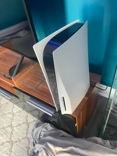 PS5 Disc Edition + 2 Controllers + Charging Dock + 65” 4K TV, View more