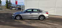 Our 2024 Honda Civic EX in Lunar Silver Metallic is in stock and ready for your driveway! Call to bo... (image 1)