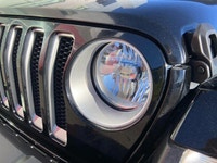 This Jeep Wrangler has a strong Gas/Electric V-6 3.6 L/220 engine powering this Automatic transmissi... (image 8)