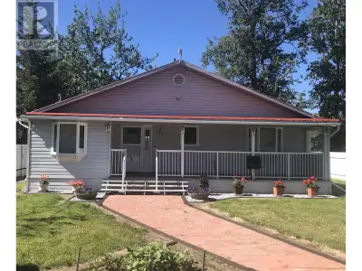 Lakeshore Living! Welcome to your one-of-a-kind four-season dream property on the shores of pristine...