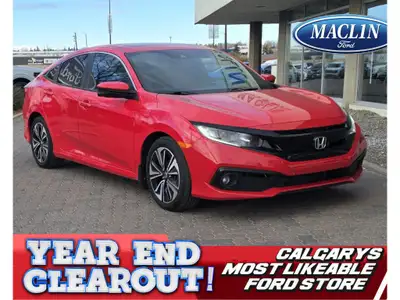 Year End Clearout on now! Get your best deal on every New and Used Vehicle at Maclin Ford - Calgary'...
