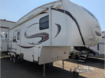 Enjoy camping with your family in this triple slide Sabre Silhouette bunkhouse fifth wheel, model 29...