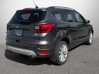 This Ford Escape boasts a Intercooled Turbo Regular Unleaded I-4 1.5 L/91 engine powering this Autom... (image 4)