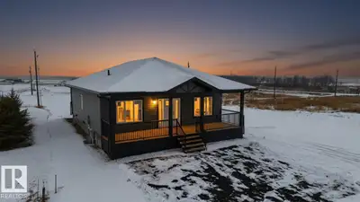 New custom-built 1,334 sq ft bungalow in the peaceful hamlet of Kingman, AB—just under 20 min to Cam...