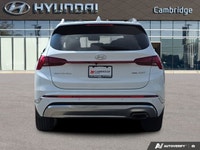 Wrapped in a stunning Quartz White, this 2022 Hyundai Santa Fe Ultimate Calligraphy offers a journey... (image 3)