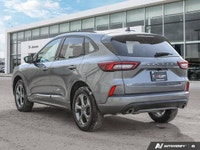 * Black mesh grille, rear wing spoiler, and body-coloured rocker panels and bumpers * Flat-bottom sp... (image 2)