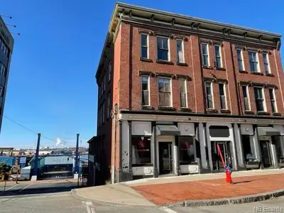 Stylish, fully renovated 2-bedroom apartment with stunning water views in the heart of Saint John. E...