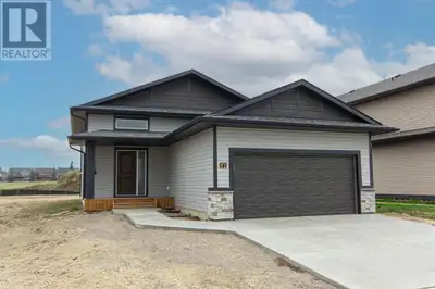 Situated just steps from a large green space, parks, playgrounds, Terrace Ridge school, and scenic w...
