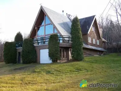 Maison de type chatet suisse de 1504 pi2/ Vue panoramique sur le Fjord / Très grand terrain de (1/4...