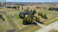 242041 1100 Drive E Rural Foothills County, Alberta