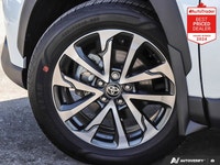 New Price! Odometer is 10048 kilometers below market average! White 2025 Toyota Corolla Cross LE SUN... (image 8)